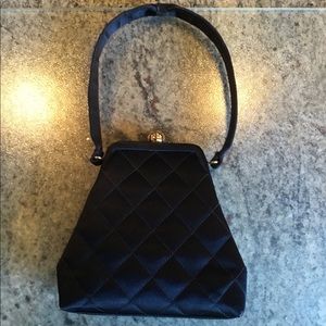 Elegant Chanel black evening bag.